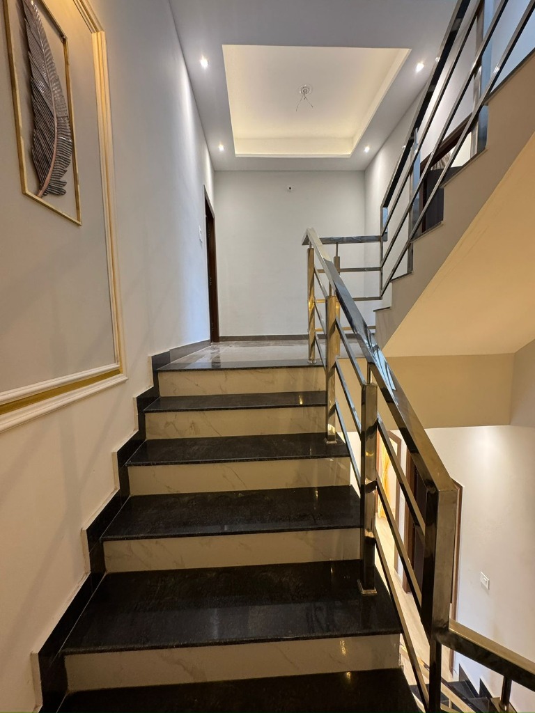 Finished staircase with steel railing