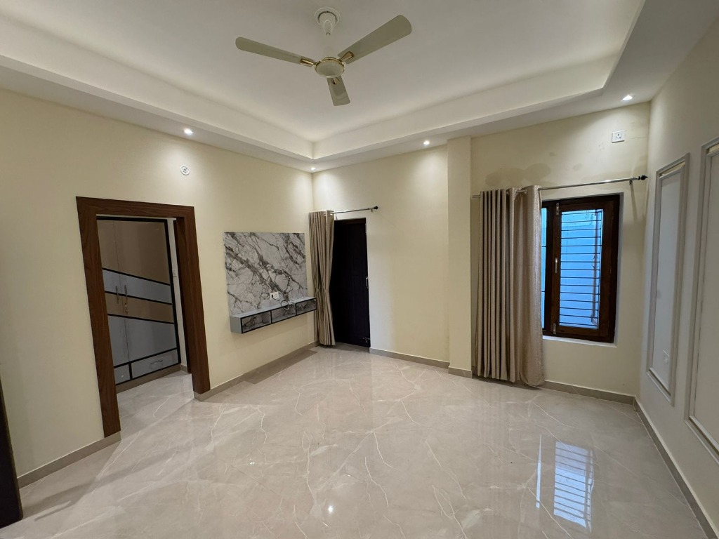 Spacious living area with TV unit